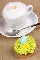 Image showing Cappuccino and Easter cupcake