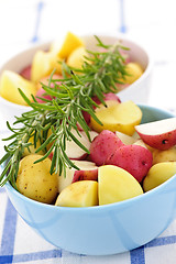 Image showing Raw cut small potatoes