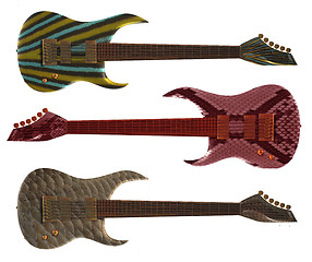 Image showing Three guitars covered with scales of fishes and a skin of a snake 