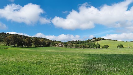 Image showing Spanish mansion among the green meadows