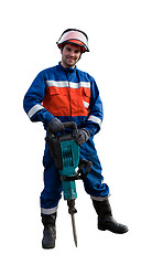 Image showing Worker in overalls with an electric hammer