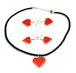 Image showing Necklace and earrings in the form of the heart. Isolated on whit