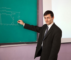 Image showing Young scientist giving a lecture