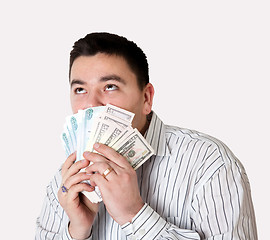 Image showing Happy young man won a large sum of money