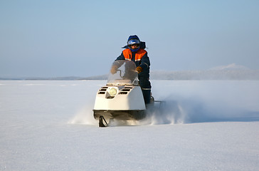 Image showing Snowmobile at full speed