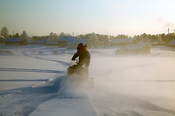 Image showing Snowmobile at full speed