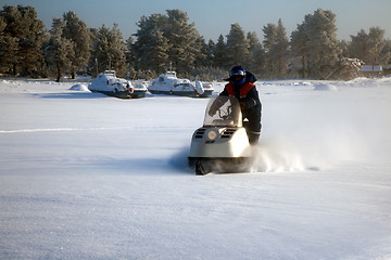Image showing Snowmobile at full speed