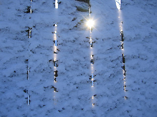 Image showing fence under a snow and sun