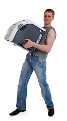 Image showing young man with a printer in the hands of