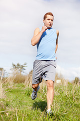 Image showing Mixed race man running