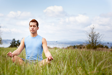 Image showing Mixed race man practicing yoga