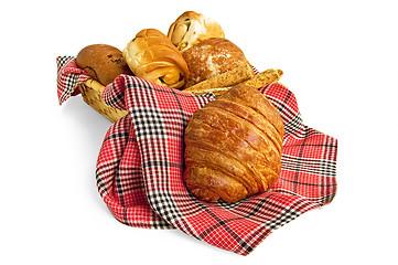 Image showing Croissant and muffins in a basket with a napkin