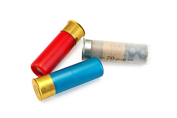 Image showing Three colored cartridges for shotguns