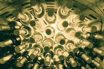 Image showing wine bottles stacked up