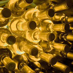 Image showing wine bottles stacked up