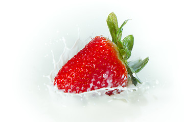 Image showing strawberry splashing into milk