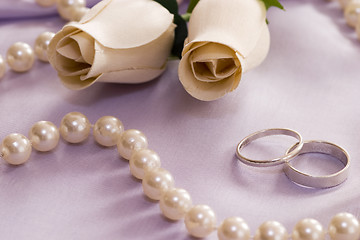 Image showing roses and wedding rings