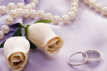 Image showing roses and wedding rings