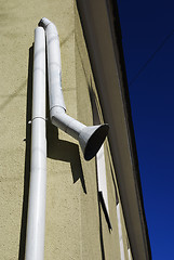 Image showing broken drain pipe on the wall