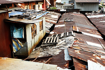 Image showing old rusty metal housing at day 