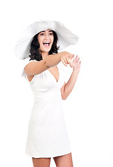 Image showing young woman in white dress and hat