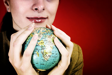 Image showing Globe in a girl's hands