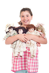 Image showing Little girl with dolls