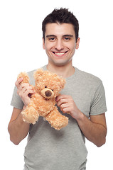 Image showing Man holding teddy bear