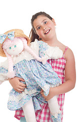 Image showing Little girl with doll