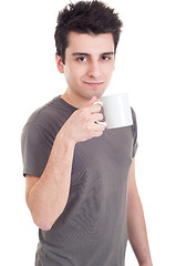 Image showing Man holding mug