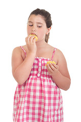 Image showing Girl eating chips