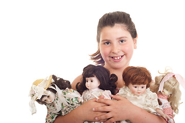 Image showing Little girl with dolls