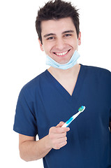 Image showing Dentist with toothbrush