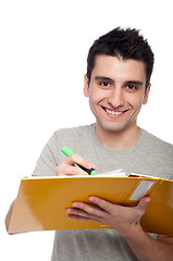 Image showing Man studying with dossier