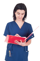 Image showing Doctor making a note