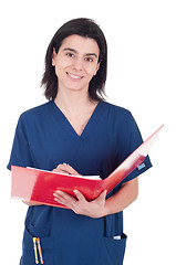 Image showing Doctor making a note