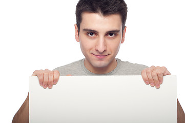 Image showing Casual man with a banner