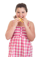 Image showing Girl eating chips