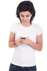 Image showing Casual woman text messaging