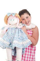 Image showing Little girl with doll