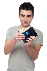 Image showing Man looking at wallet