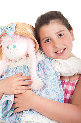 Image showing Little girl with doll