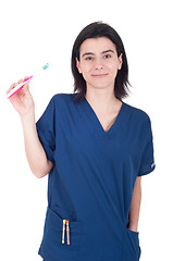 Image showing Dentist holding toothbrush