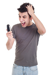 Image showing Man yelling into mobile
