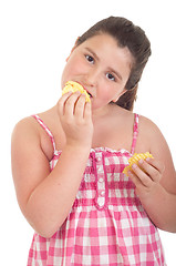 Image showing Girl eating chips