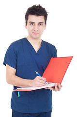 Image showing Doctor making a note