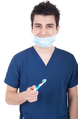 Image showing Dentist with toothbrush