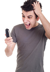 Image showing Man yelling into mobile