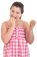 Image showing Girl eating chips