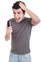 Image showing Man yelling into mobile